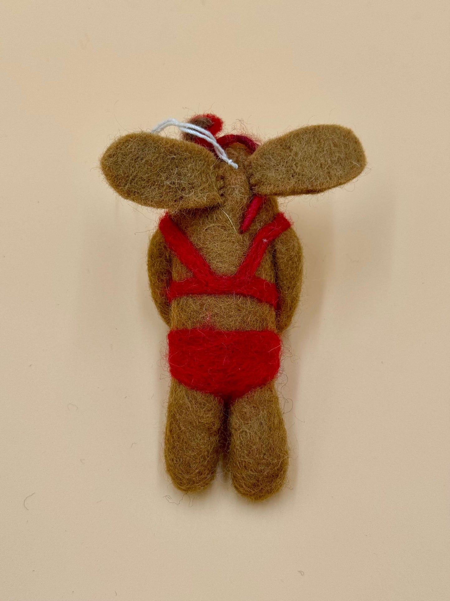 Handmade felt keychain of a dog in a red bikini, unique design made from 100% wool, Size M.