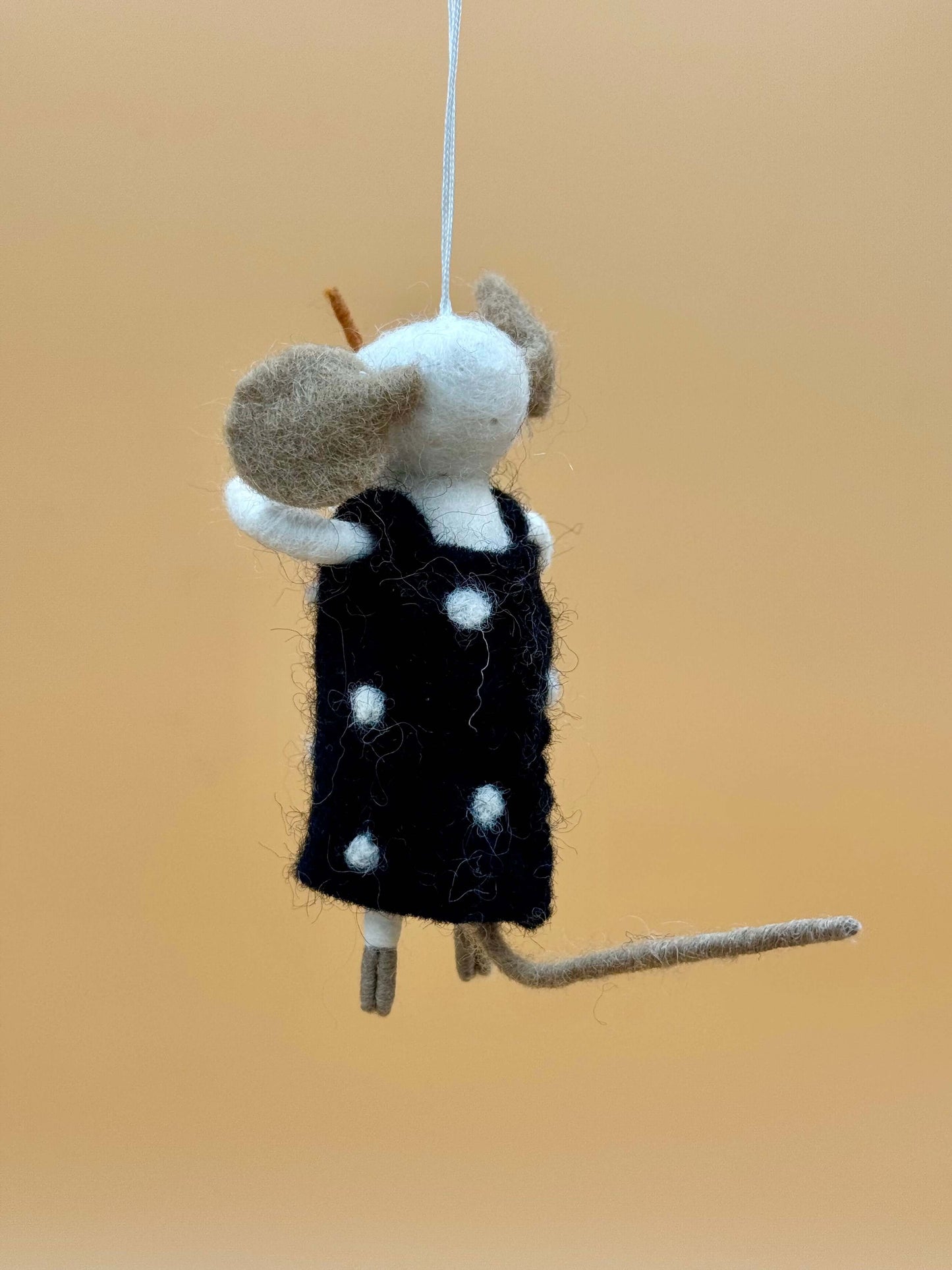 Handmade brown and white felt mouse keychain with a black dress, perfect for decorating keys or bags.