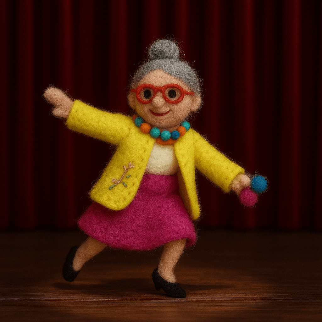 Handmade felt keychain featuring a dancing grandma in yellow and pink attire, showcasing unique wool craftsmanship.