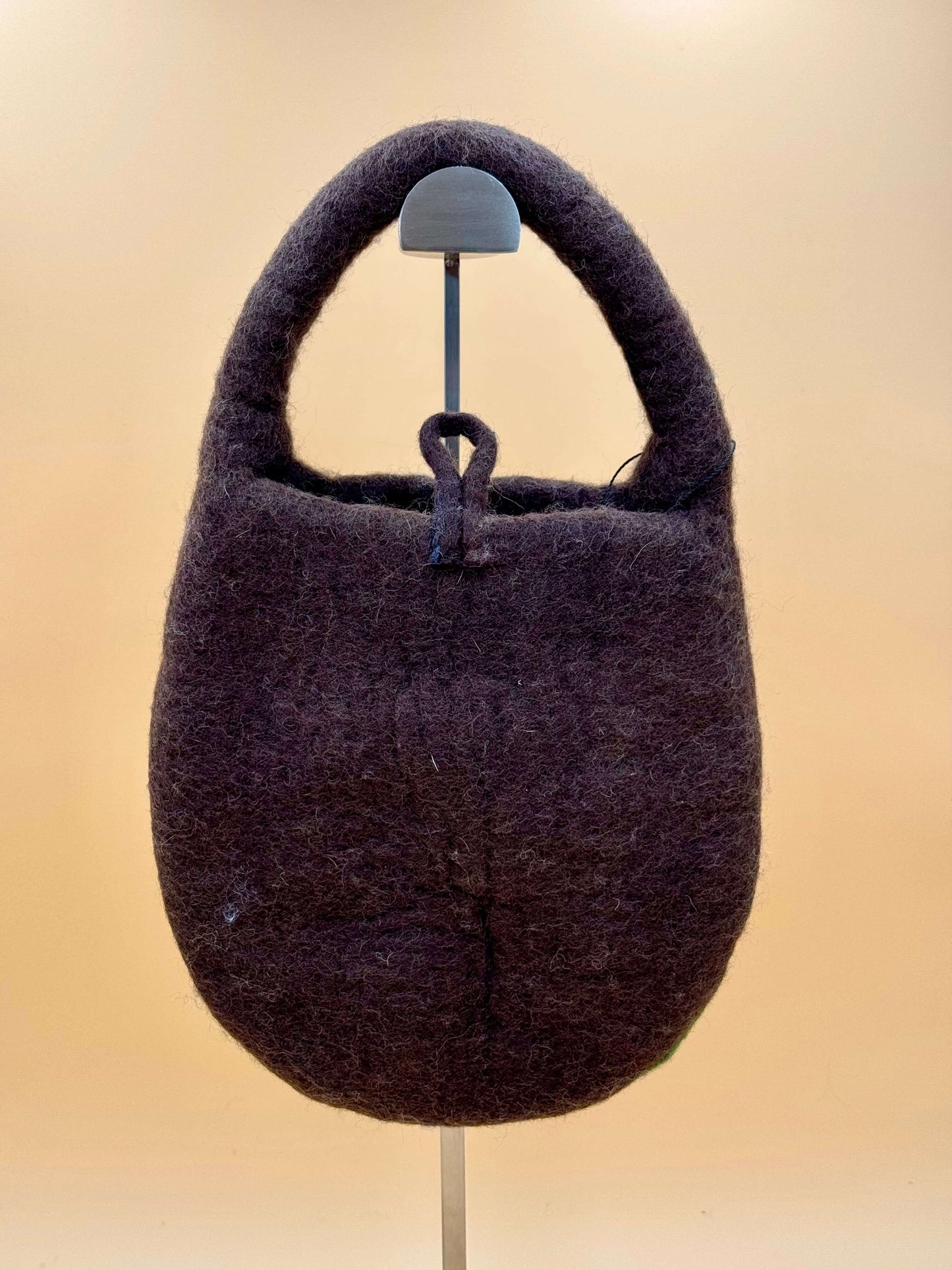 Handmade Size S brown felt bucket bag with a handle and button closure, perfect for essentials.