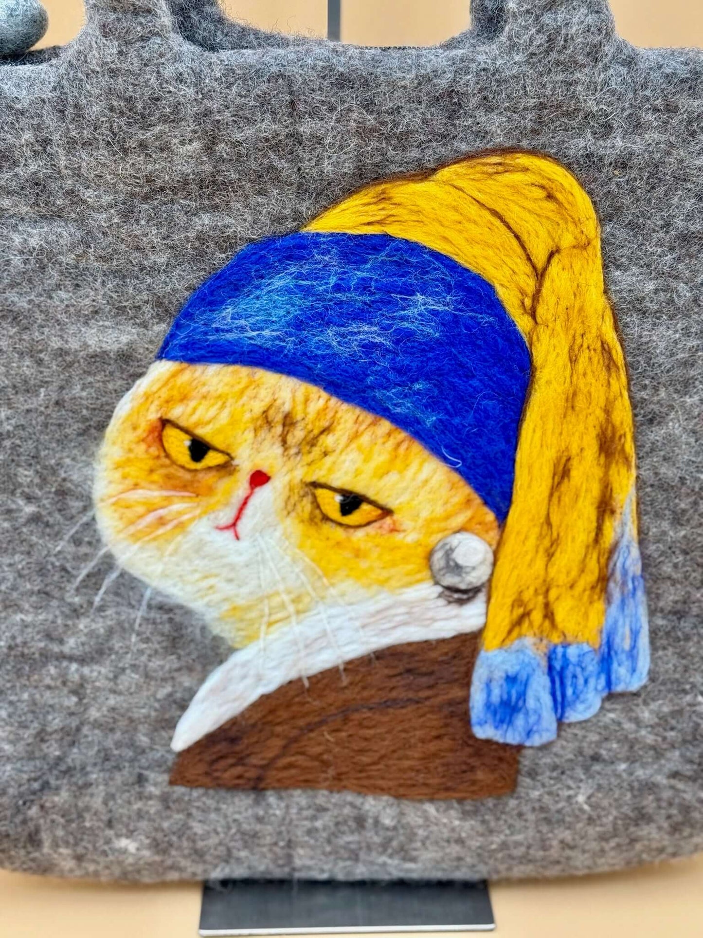 Handmade felt bag featuring a cat artwork inspired by the Girl with a Pearl Earring, size L, gray with colorful details.