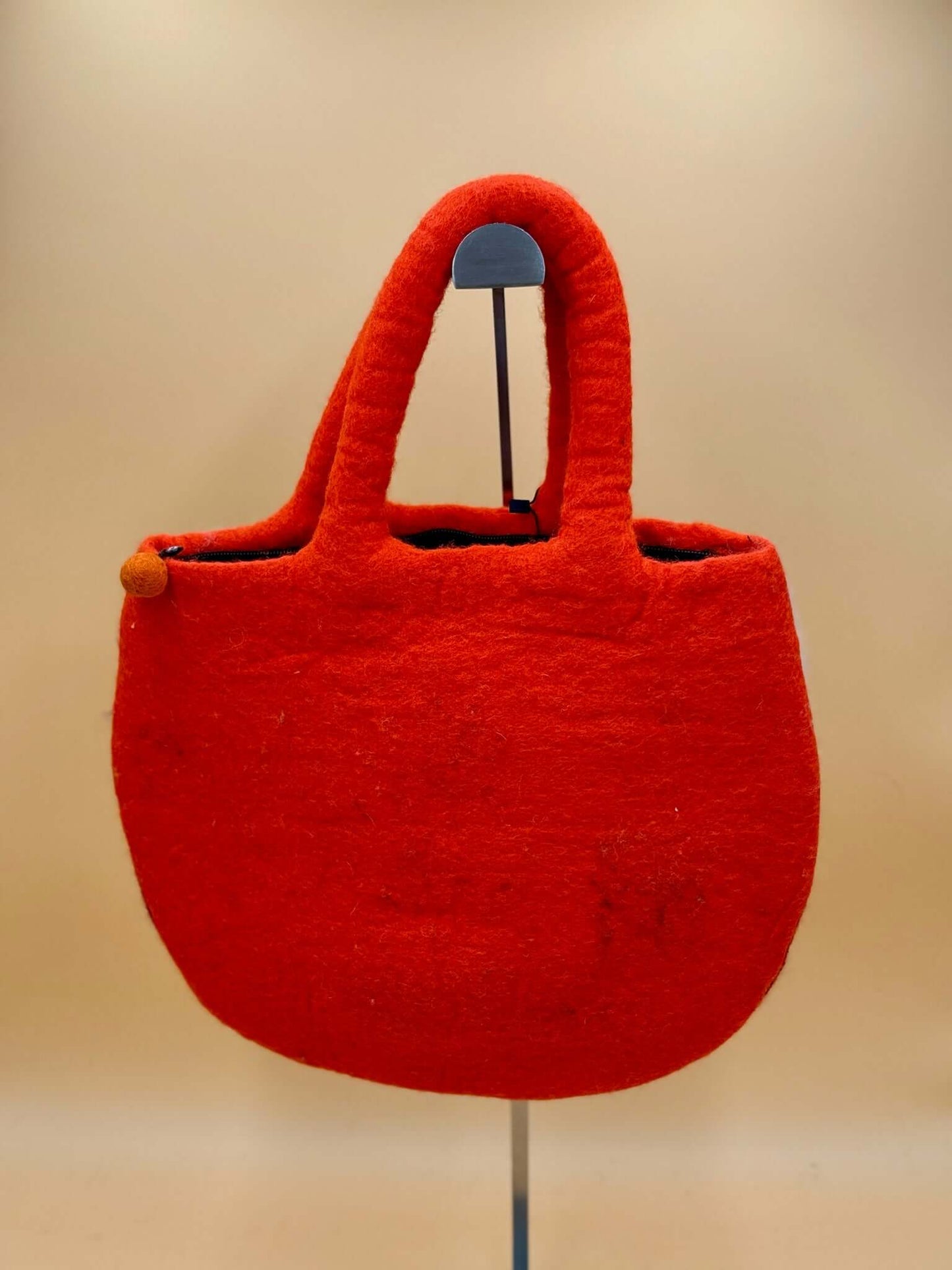Handmade orange felt tote bag Size L with handles, perfect for everyday use and storage.