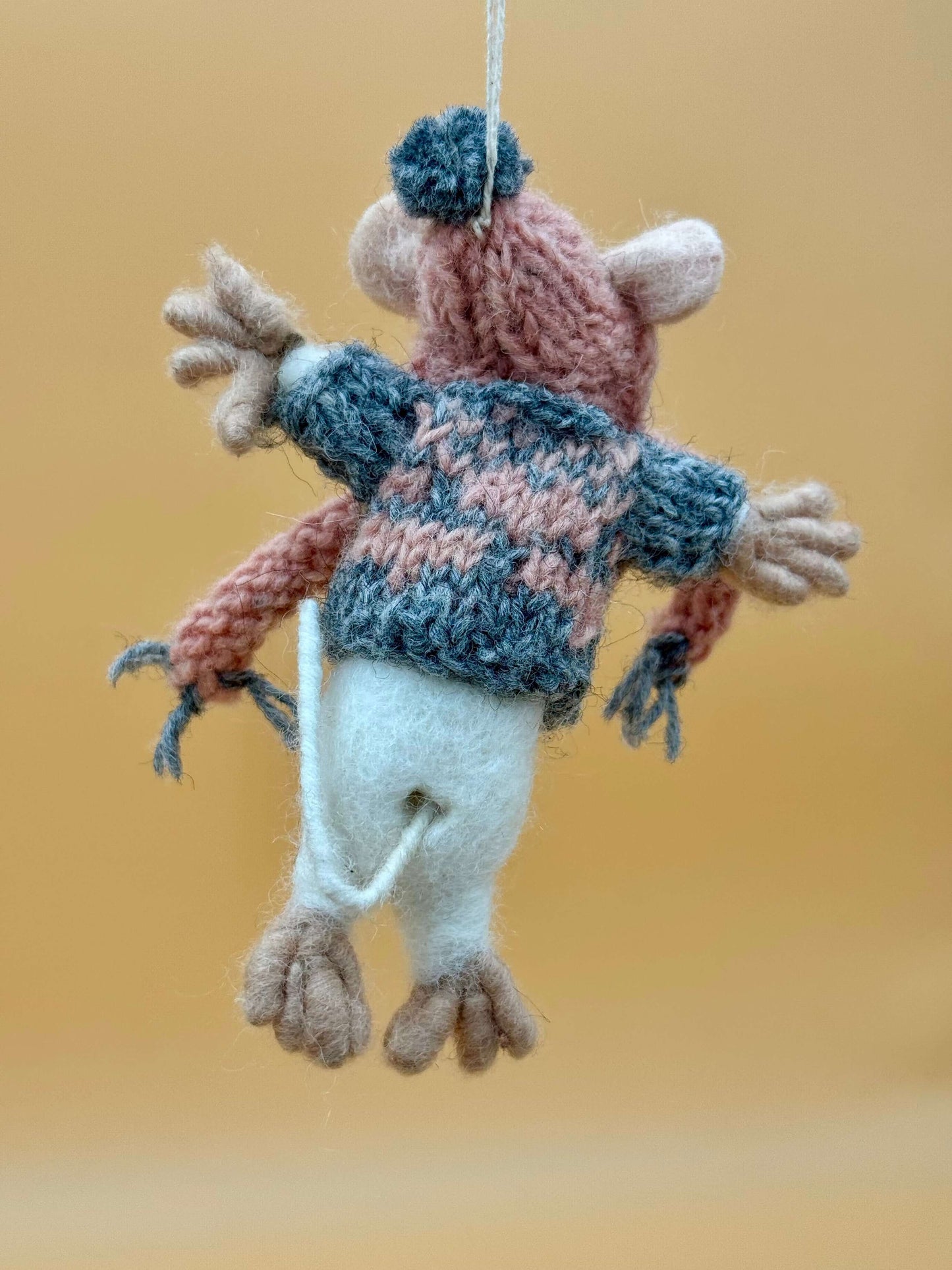 Handcrafted felt mouse keychain with hat and scarf in white, gray, and pink. Perfect unique decorative accessory.