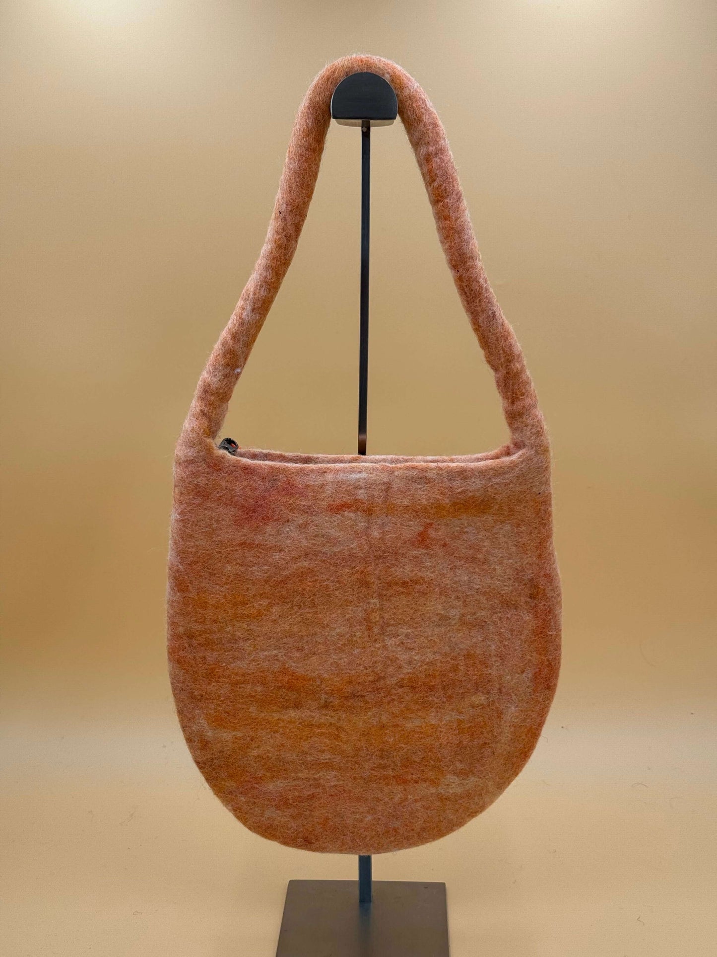 Handmade orange felt shoulder bag M size, Baguette style, featuring a soft wool design and crafting details.