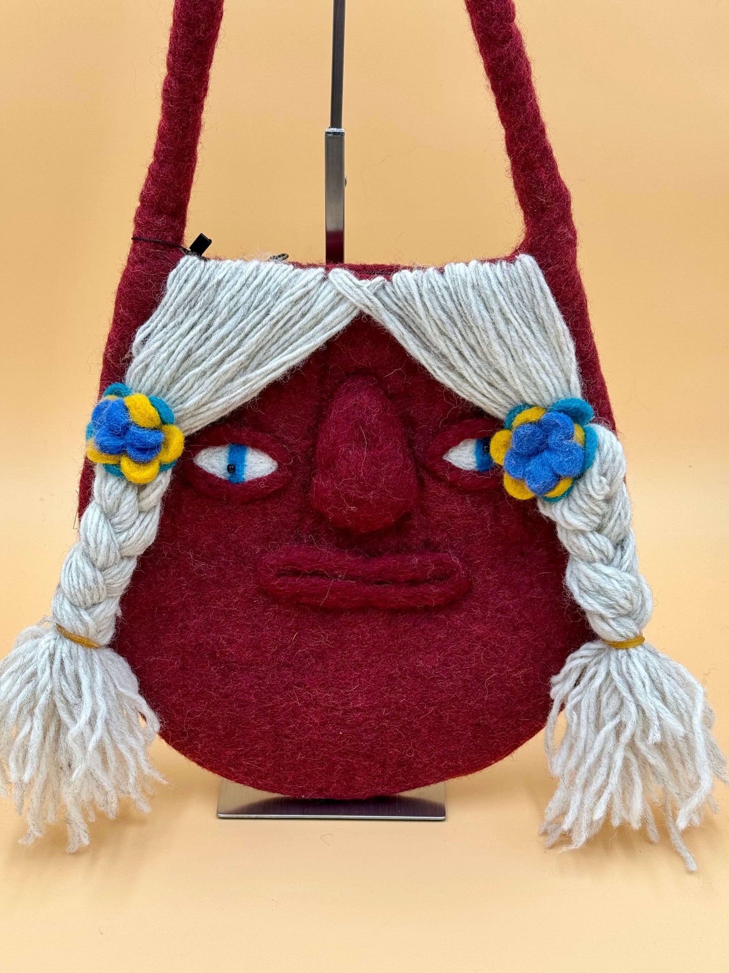 Schultertasche Filztasche Size M Baguette Bag Ugly Girl in red with unique face design and braided hair.