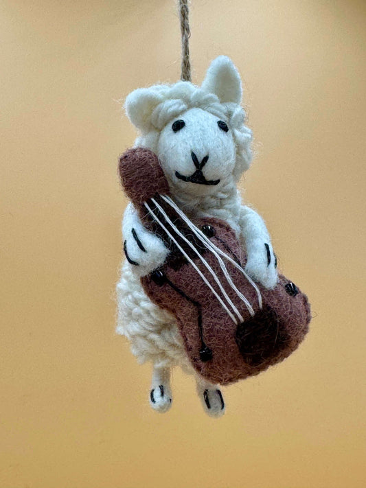 Handgemaachter Filzanhänger Schlüsselanhänger Schaf mit Cello. Einzigartiges, niedliches Design in Wolle.