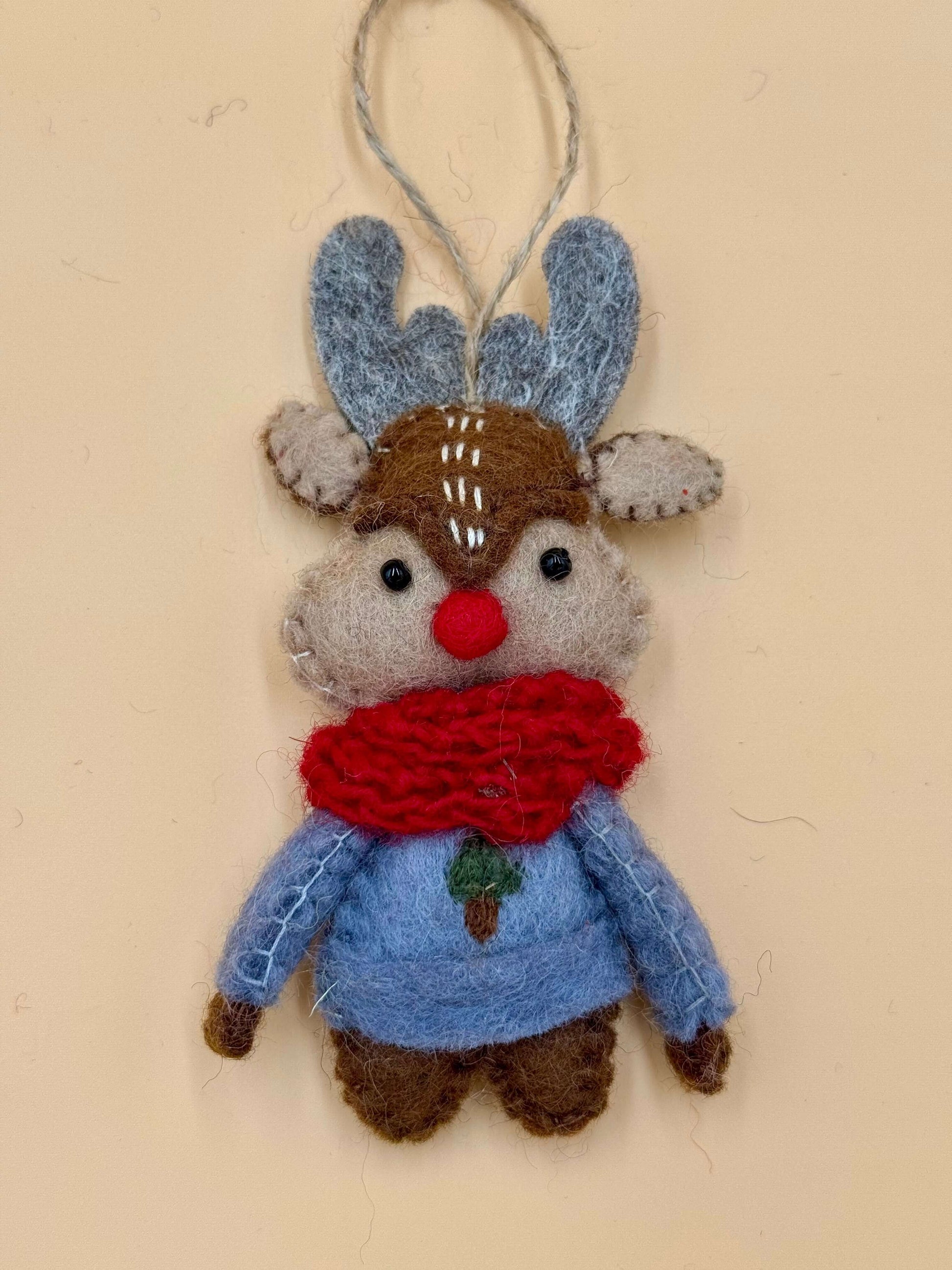 Handmade reindeer felt keychain with red scarf, blue shirt, and brown antlers, 100% wool