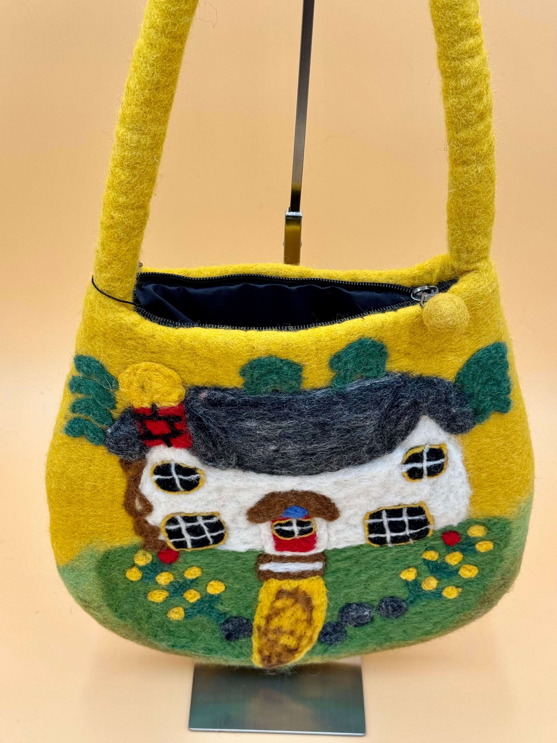 Handmade yellow felt shoulder bag with cottage design, featuring zipper and interior lining, ideal for daily use.