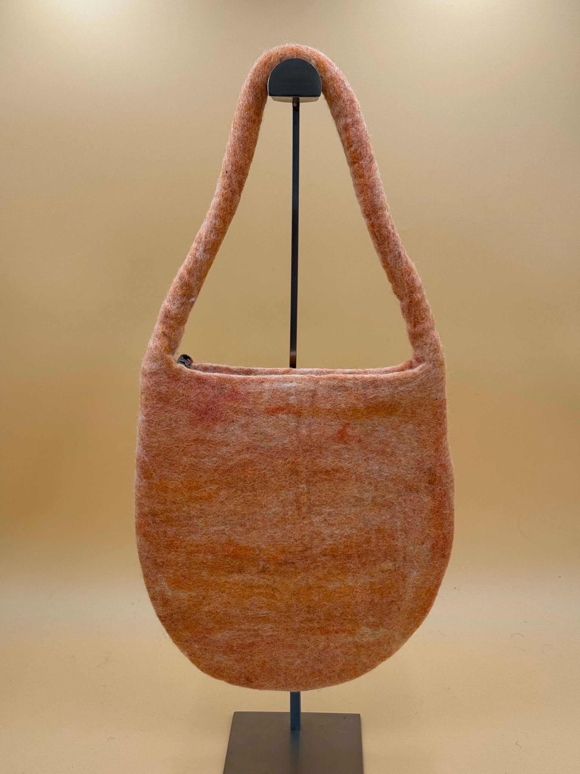 Handmade orange felt shoulder bag M size, Baguette style, featuring a soft wool design and crafting details.