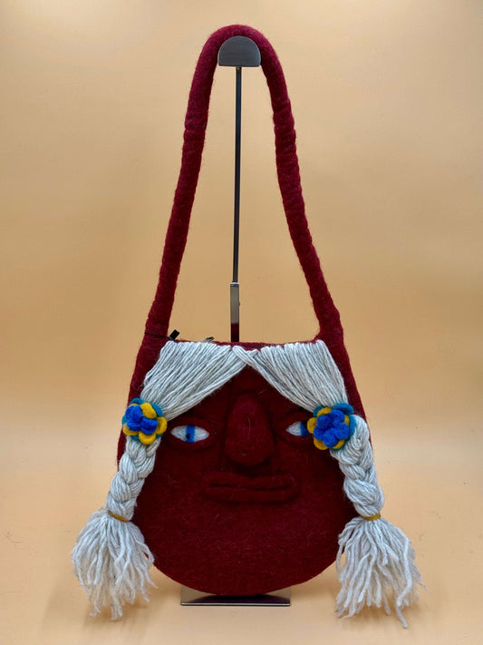 Schultertasche Filztasche Size M Baguette Bag Ugly Girl, handgemachte rote Filztasche mit einzigartigem Gesichtsmuster.