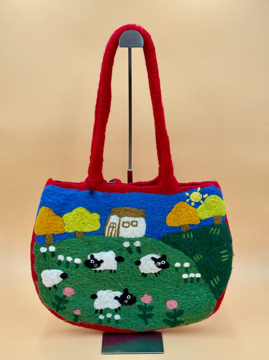 Handmade shoulder felt bag, size L, featuring sheep design, vibrant colors, 100% wool, perfect for everyday use.